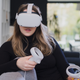 Photo of a person wearing Oculus Quest 2 headset
